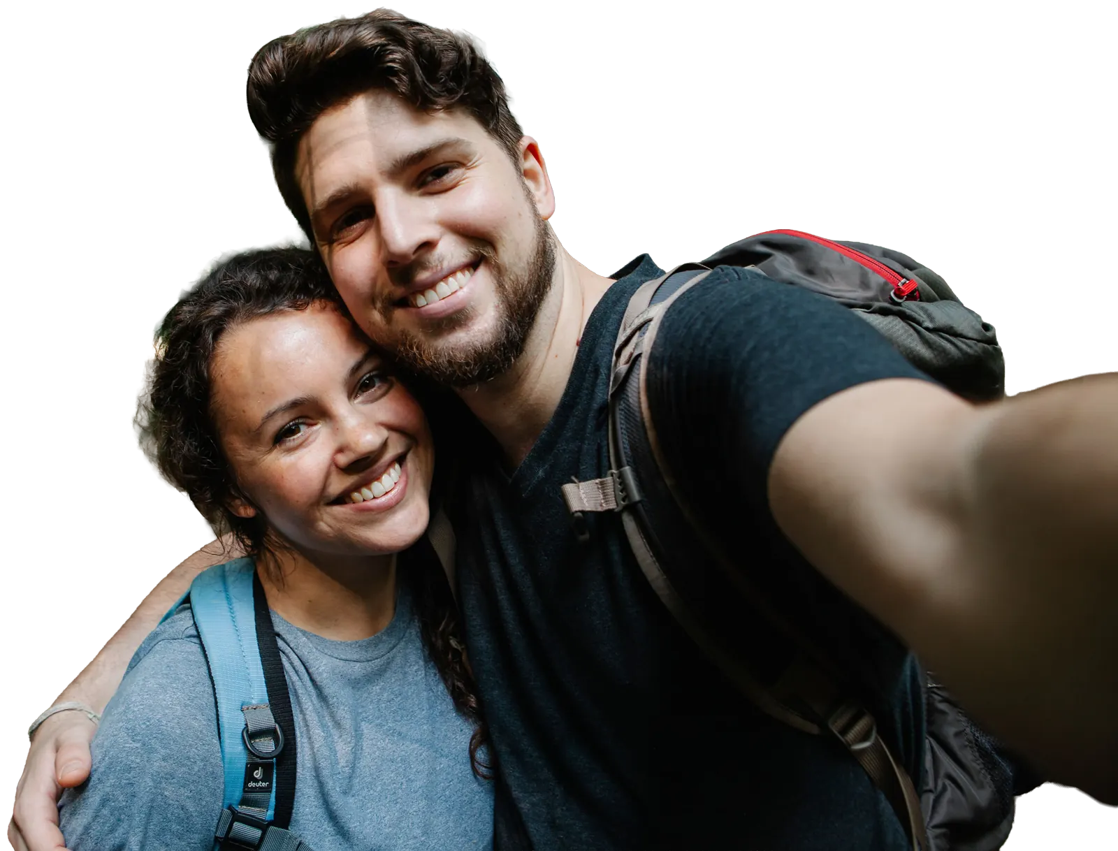 Young couple with backpacks taking a selfie