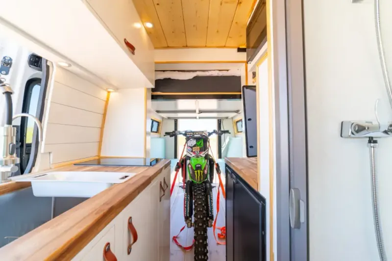 Elevator bed moto van